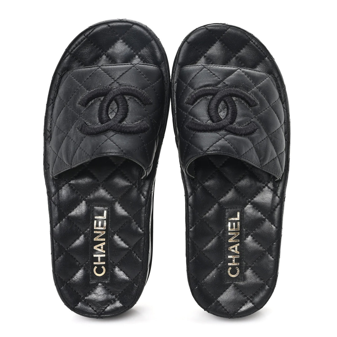 CHANEL QUILTED LAMBSKIN LEATHER CC LOGO MULES