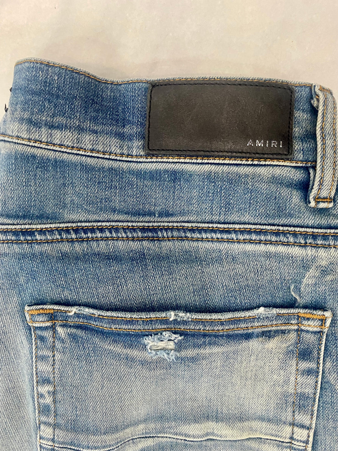 AMIRI DISTRESSED SCREEN PRINT BANDANA JEANS