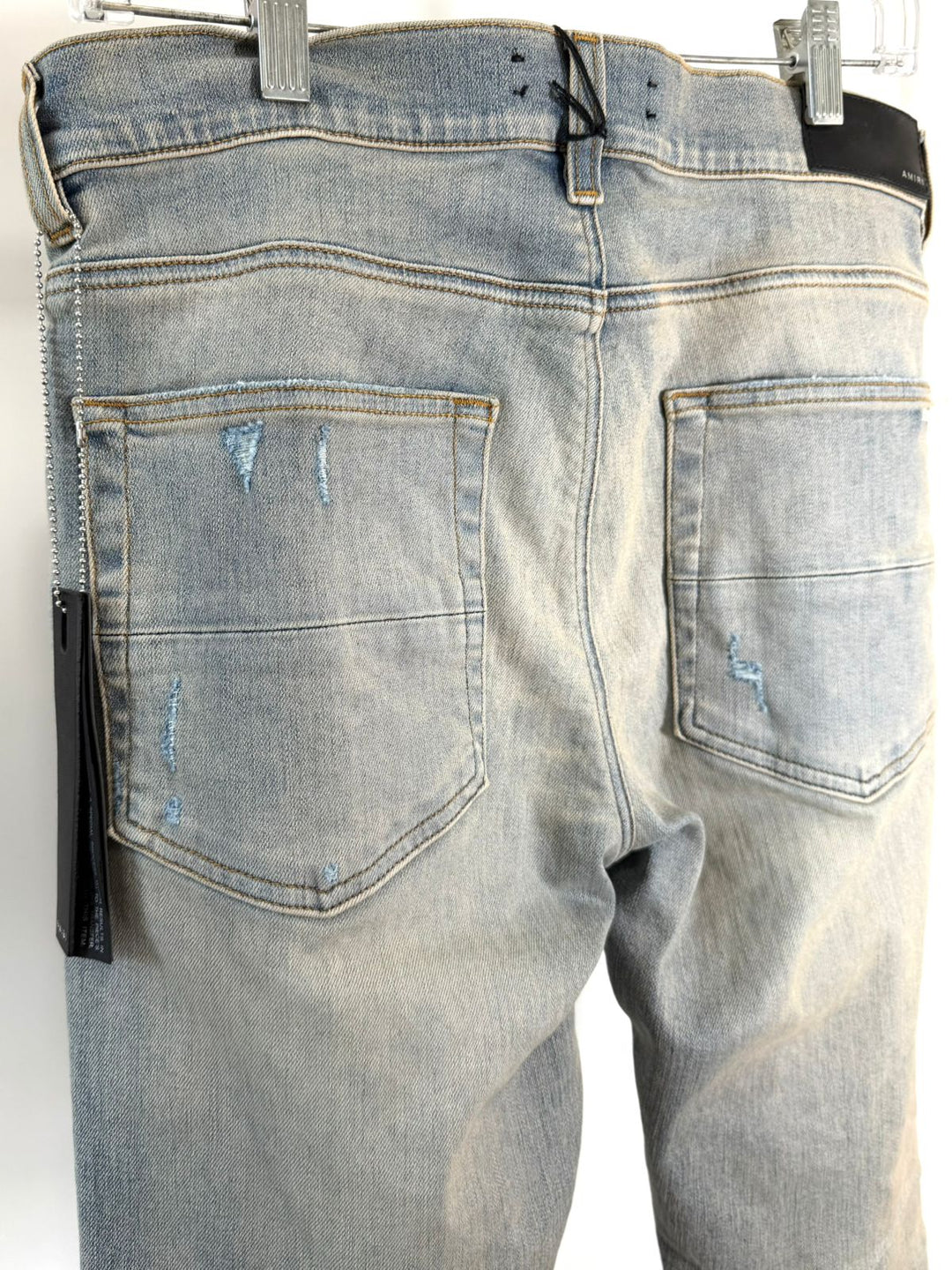AMIRI MX1 BANDANA DISTRESSED SKINNY JEANS