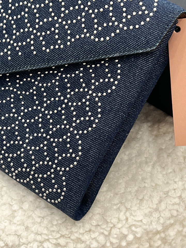 ALAÏA OUM ARABESQUE STUDDED ENVELOPE CLUTCH BAG