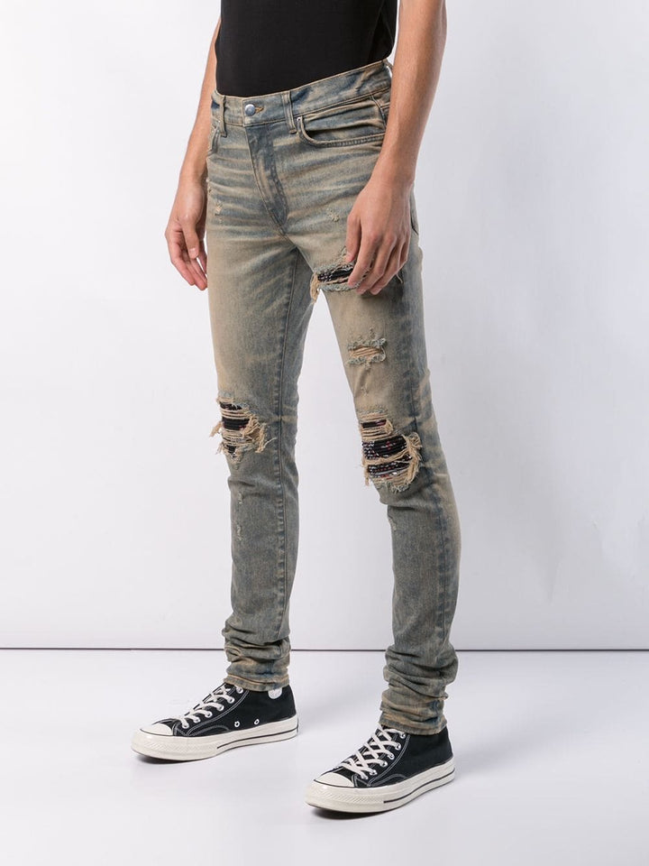 AMIRI MX1 BANDANA DISTRESSED SKINNY JEANS