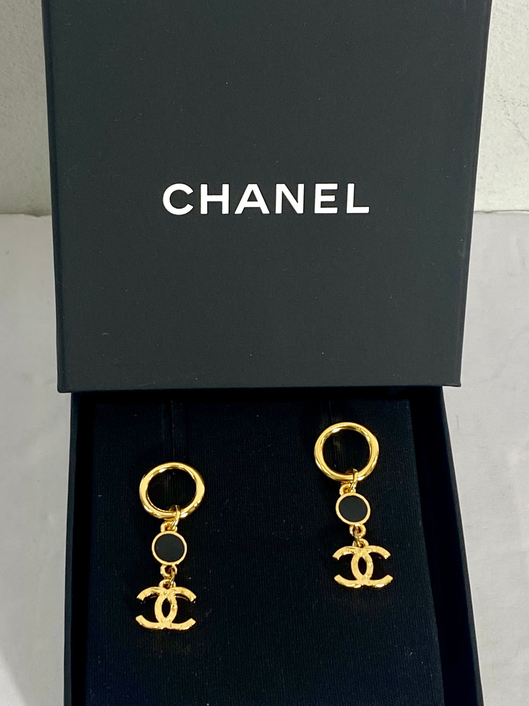 CHANEL GOLD TONE BLACK ENAMEL DANGLE EARRINGS