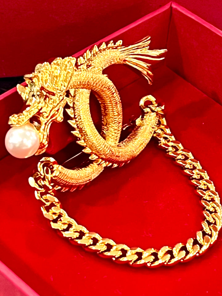 CHANEL CC LOGO LUNAR NEW YEAR DRAGON BROOCH