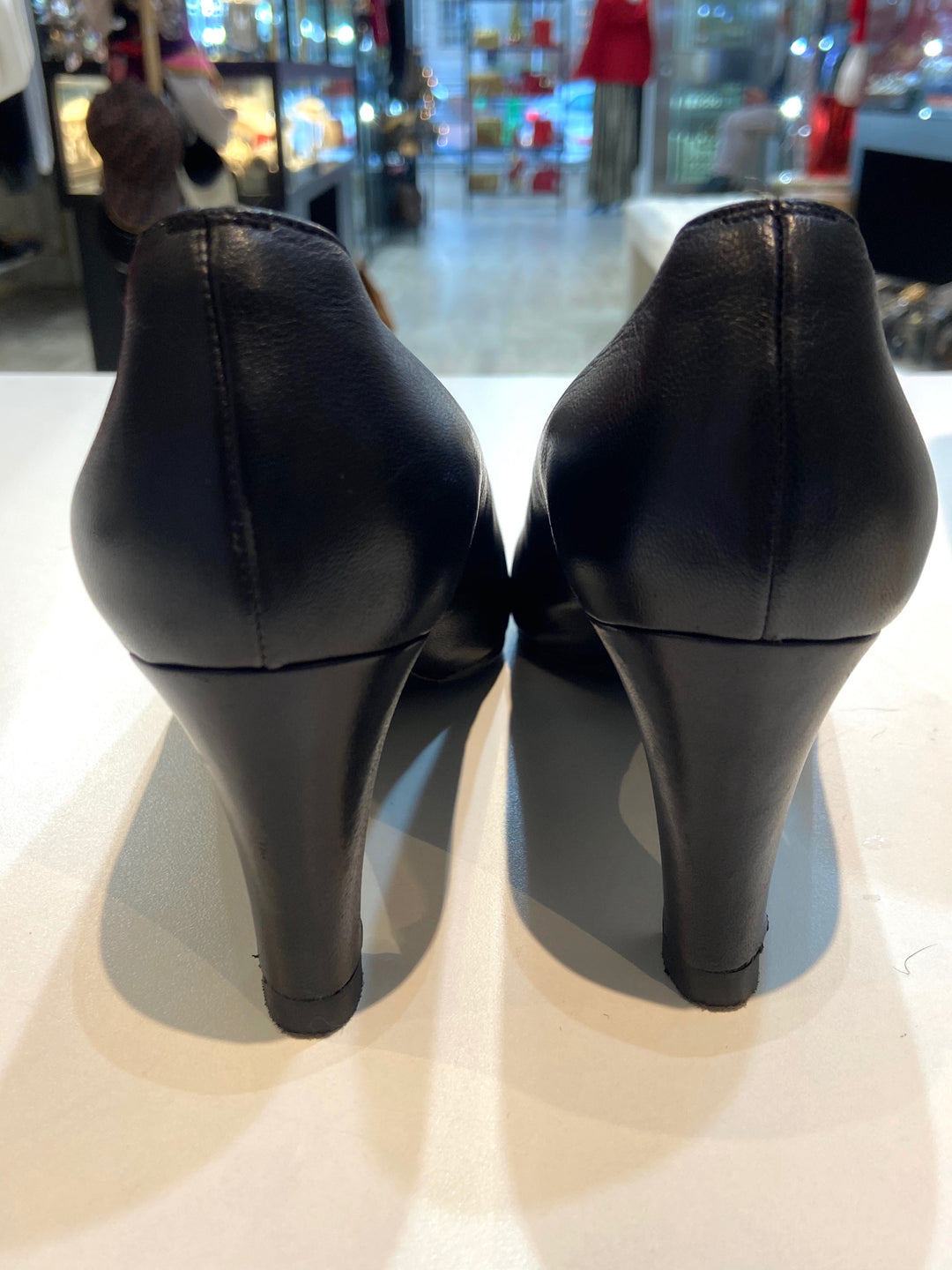 CHANEL CC TURN-LOCK POINTED TOE CALFSKIN LEATHER PUMPS