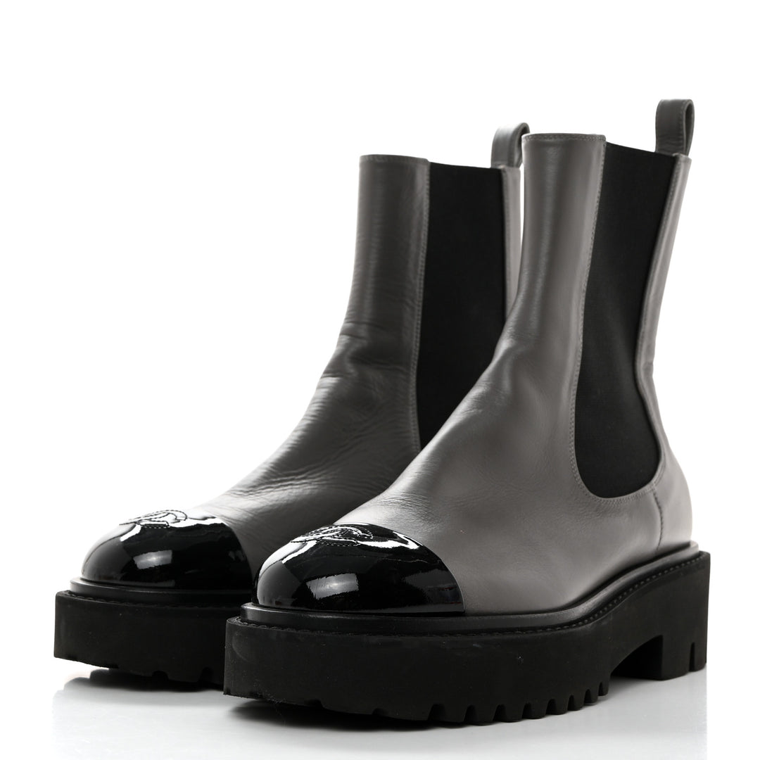 CHANEL CC CRUMPLED CALFSKIN PATENT CAP TOE CHELSEA BOOTS