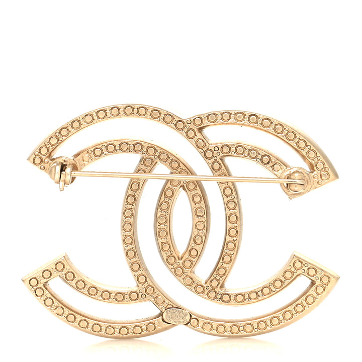 CHANEL CRYSTAL CC LIGHT GOLD-TONE BROOCH