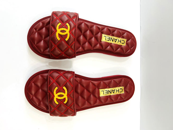 CHANEL INTERLOCKING CC LOGO QUILTED LAMBSKIN MULES