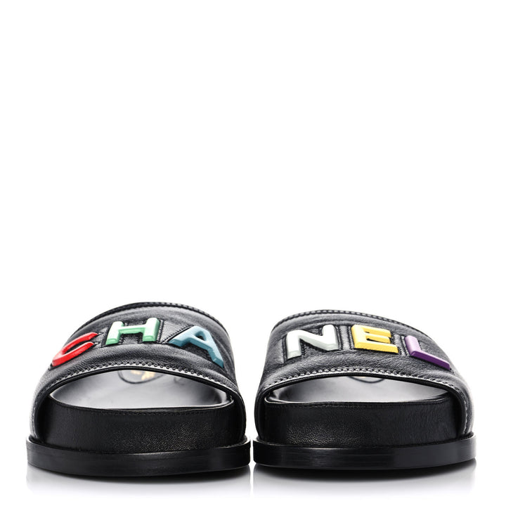 CHANEL LAMBSKIN CHA-NEL SANDLAS MULES