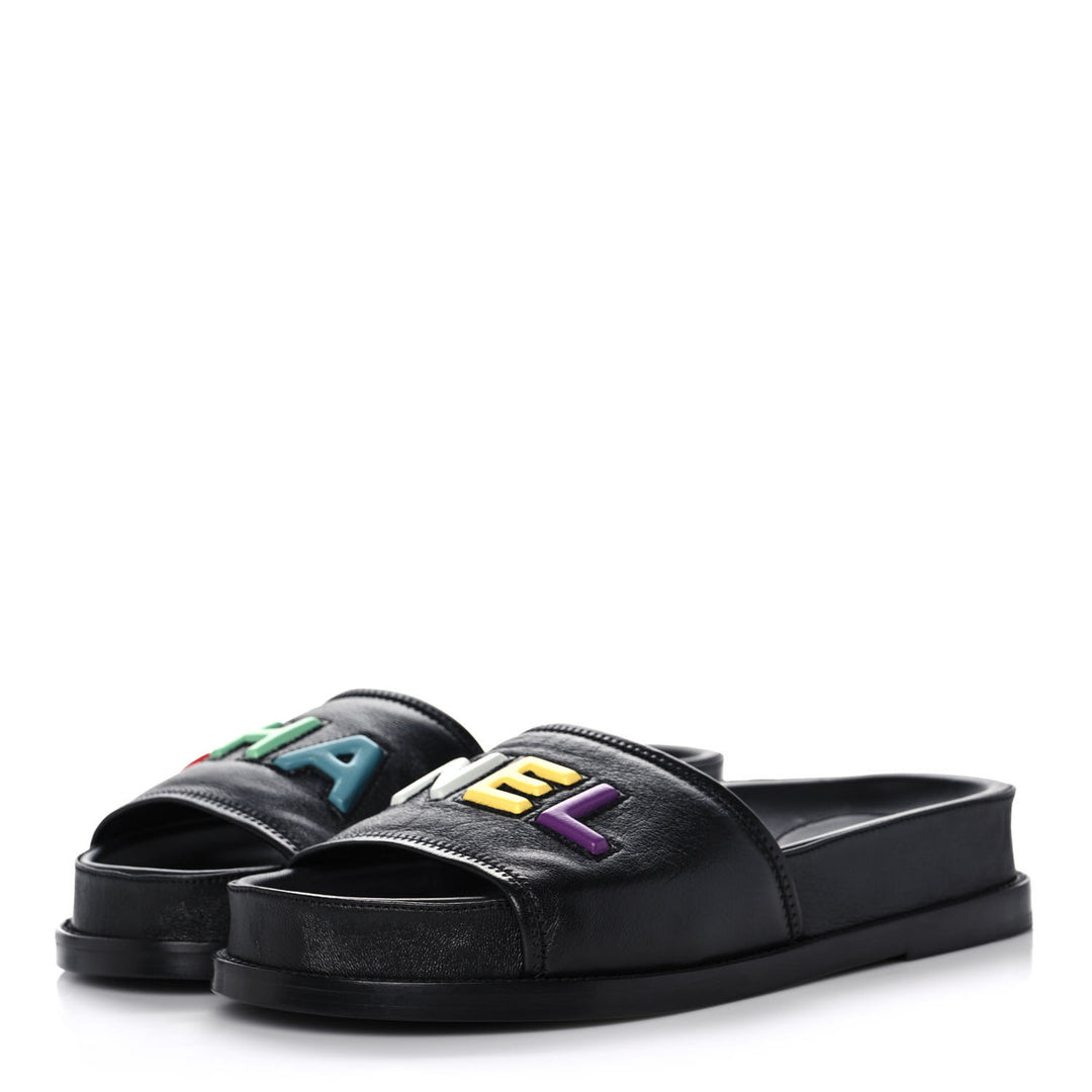 CHANEL LAMBSKIN CHA-NEL SANDLAS MULES