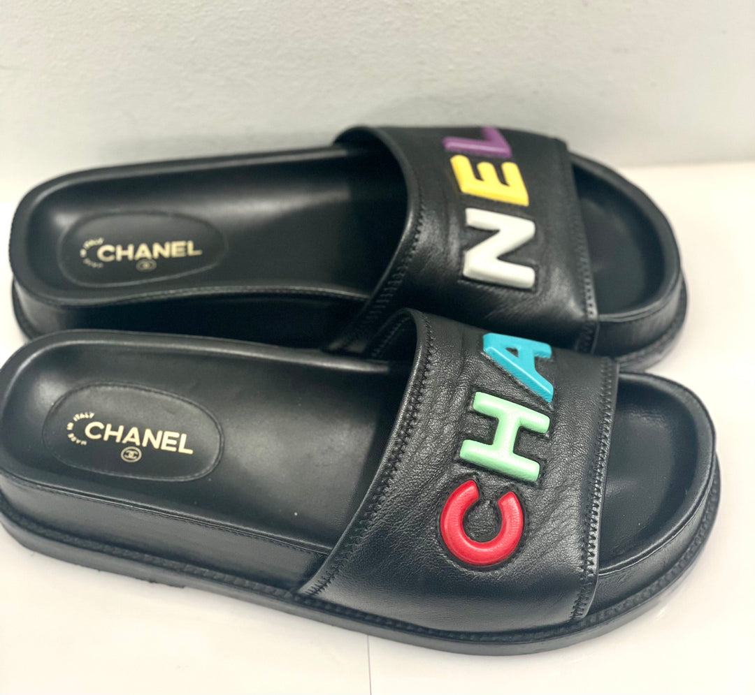 CHANEL LAMBSKIN CHA-NEL SANDLAS MULES