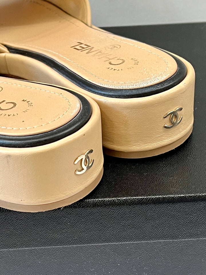 CHANEL LAMBSKIN EMBROIDERED LOGO MULES