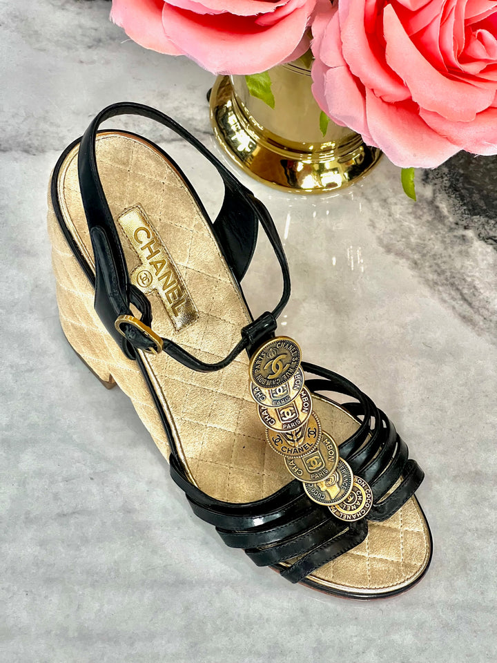 CHANEL MEDALLION QUILTED WEDGE HEEL SANDALS