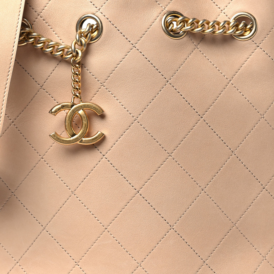 CHANEL PARIS ROME ON MY SHOULDER QUILTED CALFSKIN BUCKET BAG