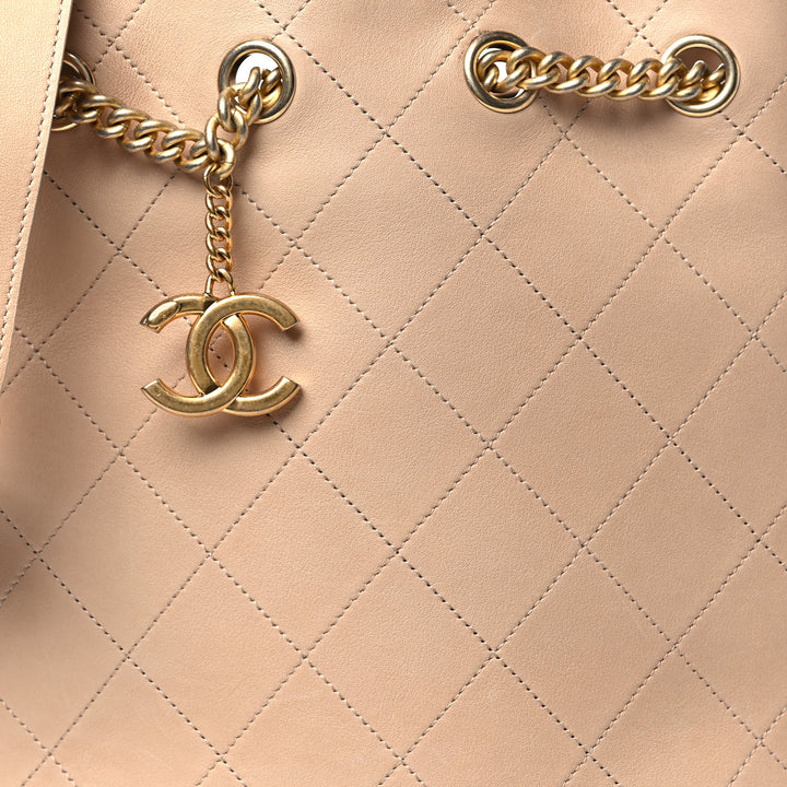 CHANEL PARIS ROME ON MY SHOULDER QUILTED CALFSKIN BUCKET BAG