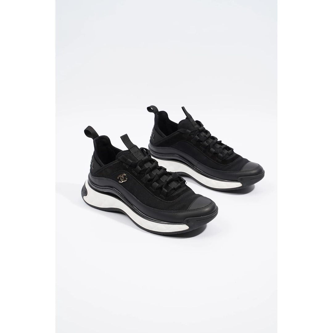 CHANEL QUILTED CC TRAINER SNEAKERS