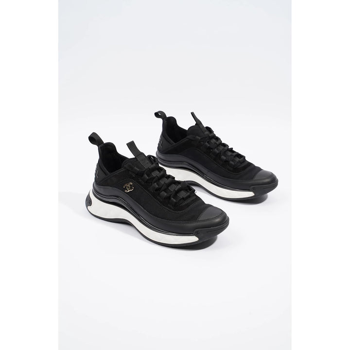 CHANEL QUILTED CC TRAINER SNEAKERS