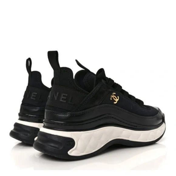 CHANEL QUILTED CC TRAINER SNEAKERS