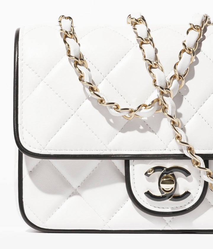 CHANEL QUILTED LAMBSKIN MINI GRAPHIC FRAME FLAP BAG