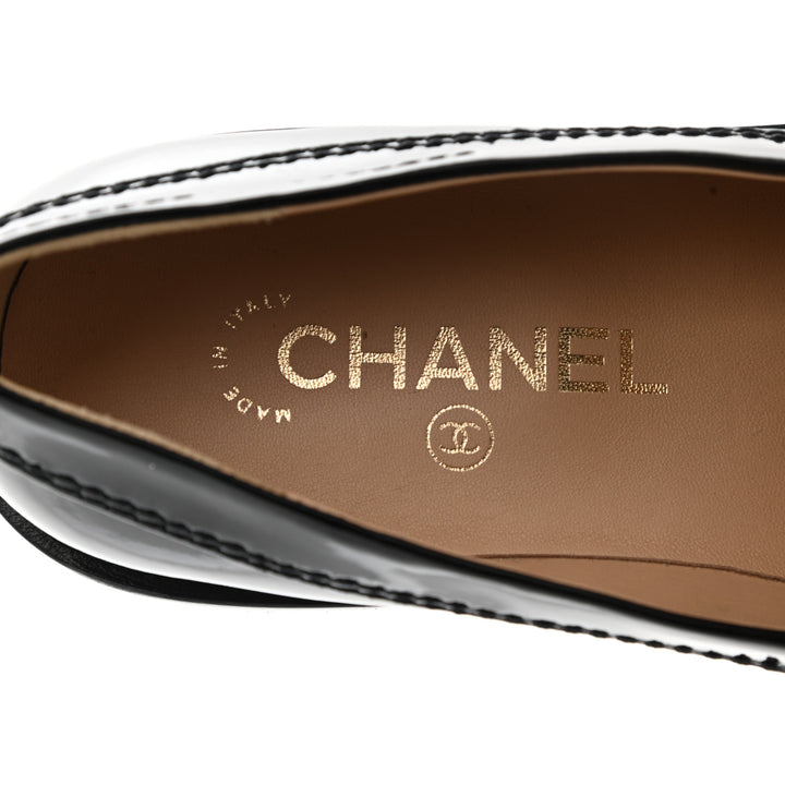 CHANEL SHINY PATENT CALFSKIN LOGO LOAFERS