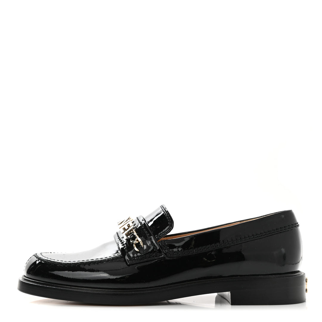 CHANEL SHINY PATENT CALFSKIN LOGO LOAFERS