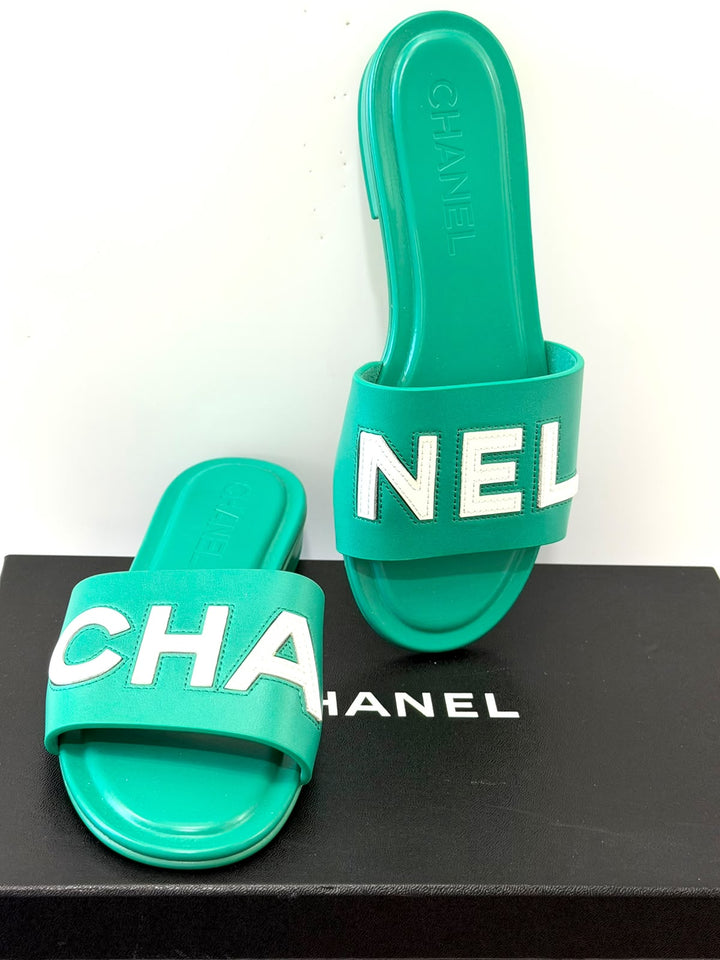 CHANEL CALFSKIN PATENT LOGO MULES