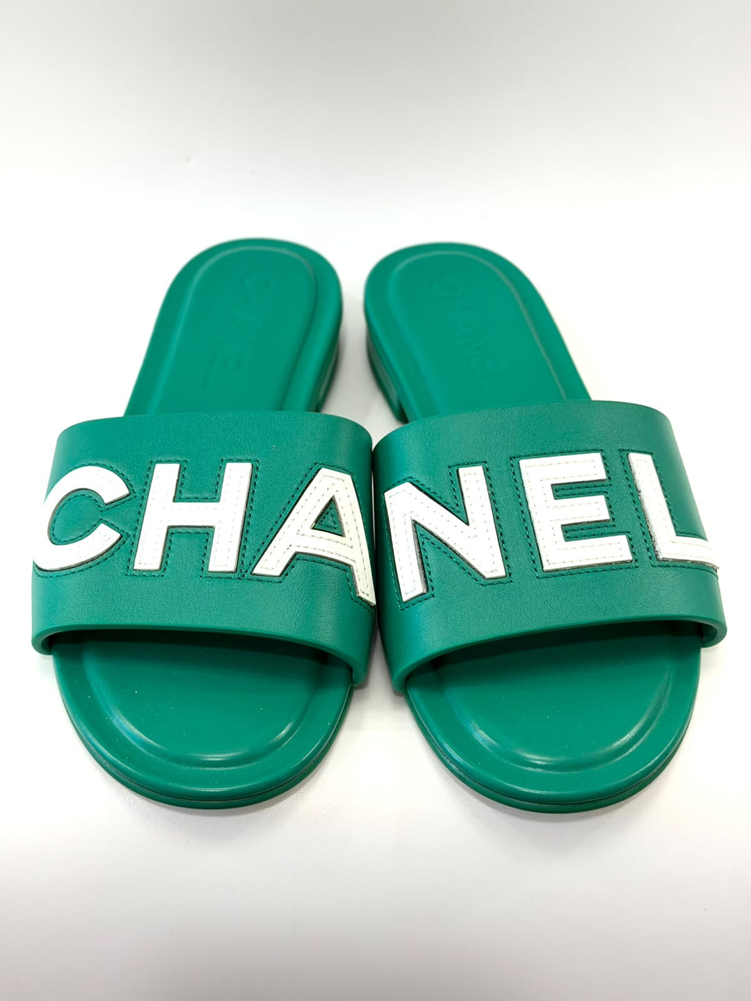 CHANEL CALFSKIN PATENT LOGO MULES