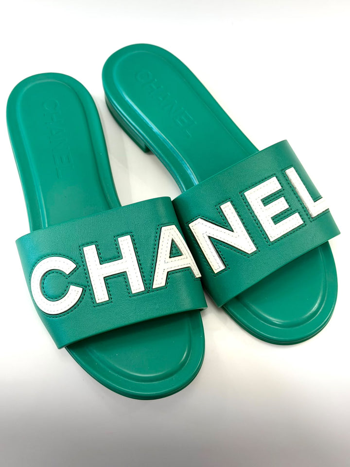 CHANEL CALFSKIN PATENT LOGO MULES
