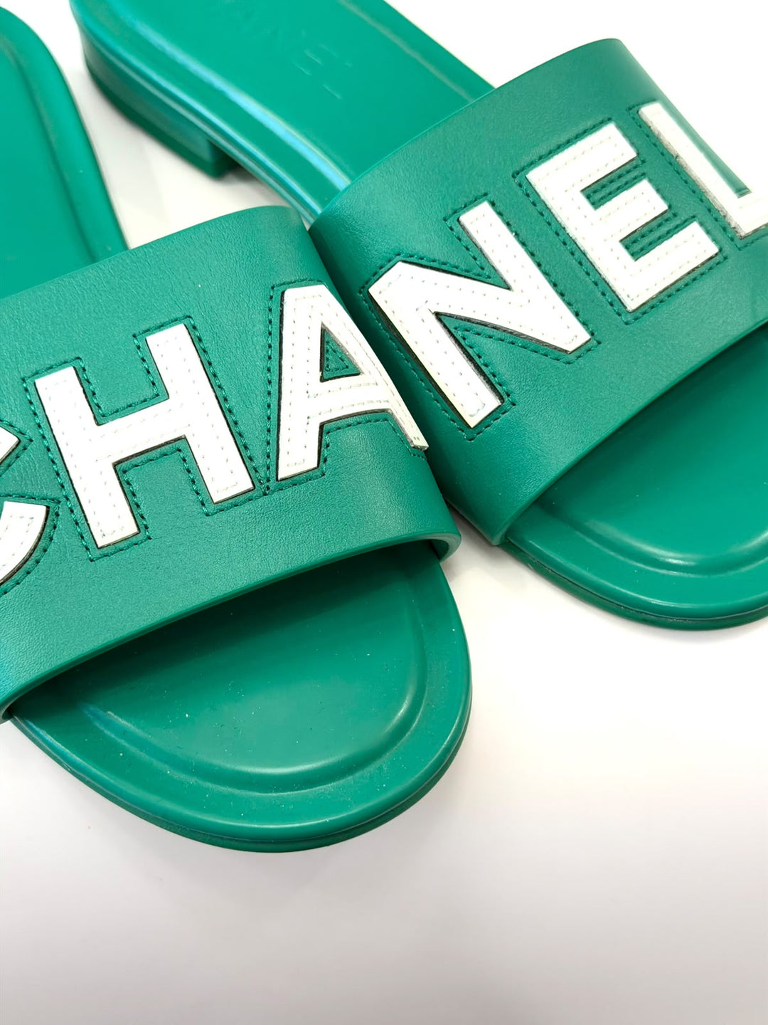 CHANEL CALFSKIN PATENT LOGO MULES