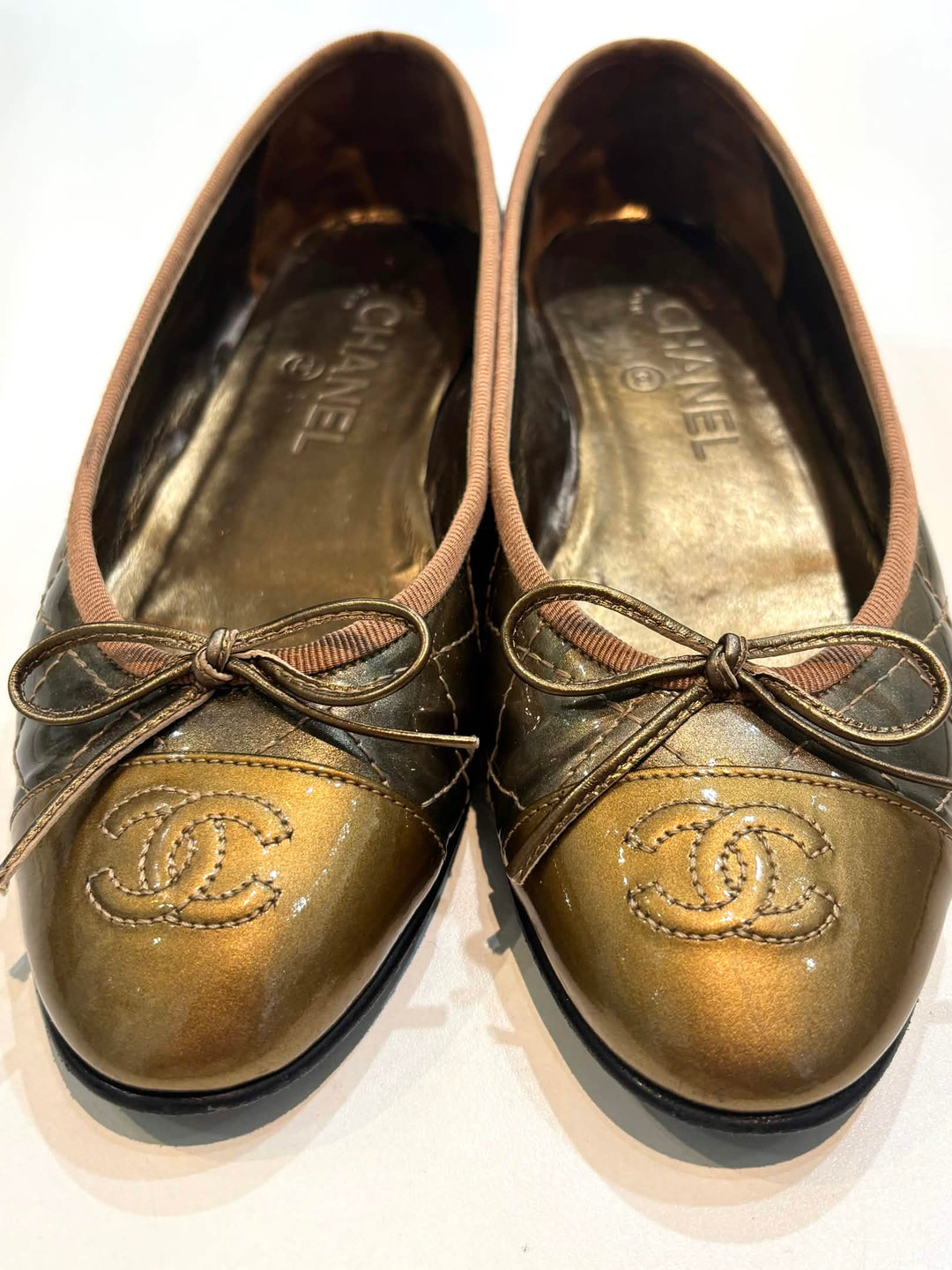 CHANEL GOLD QUILTED CC LOGO BALLET FLATS