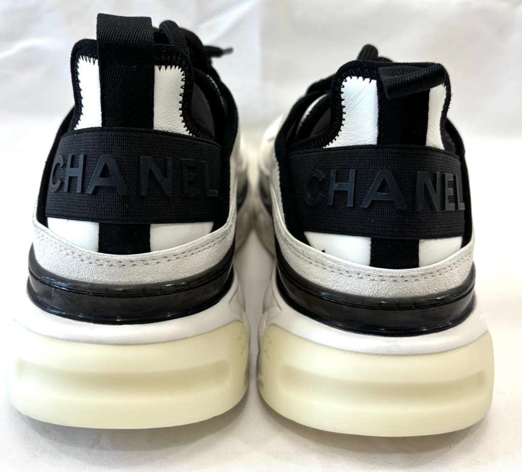 CHANEL INTERLOCKING CC LOGO LEATHER SNEAKERS