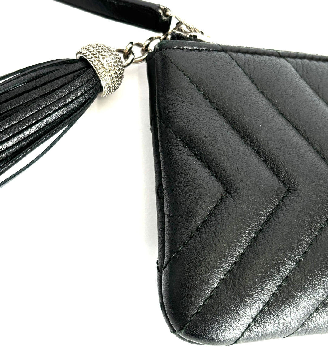 CHANEL LEATHER CHEVRON MINI TASSEL ZIP POUCH