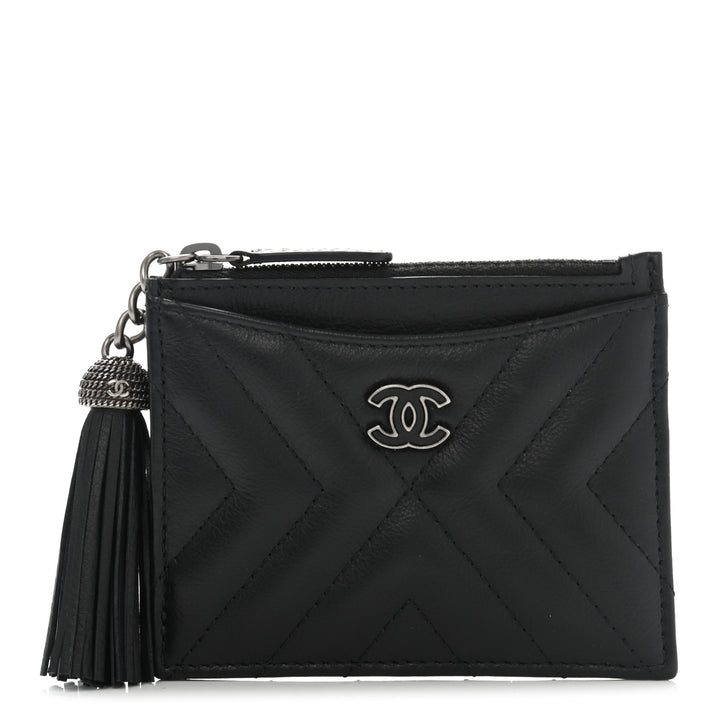 CHANEL LEATHER CHEVRON MINI TASSEL ZIP POUCH