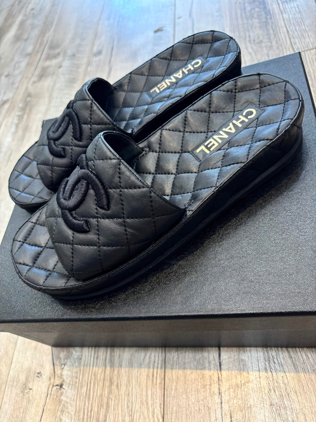 CHANEL QUILTED LAMBSKIN LEATHER CC LOGO MULES