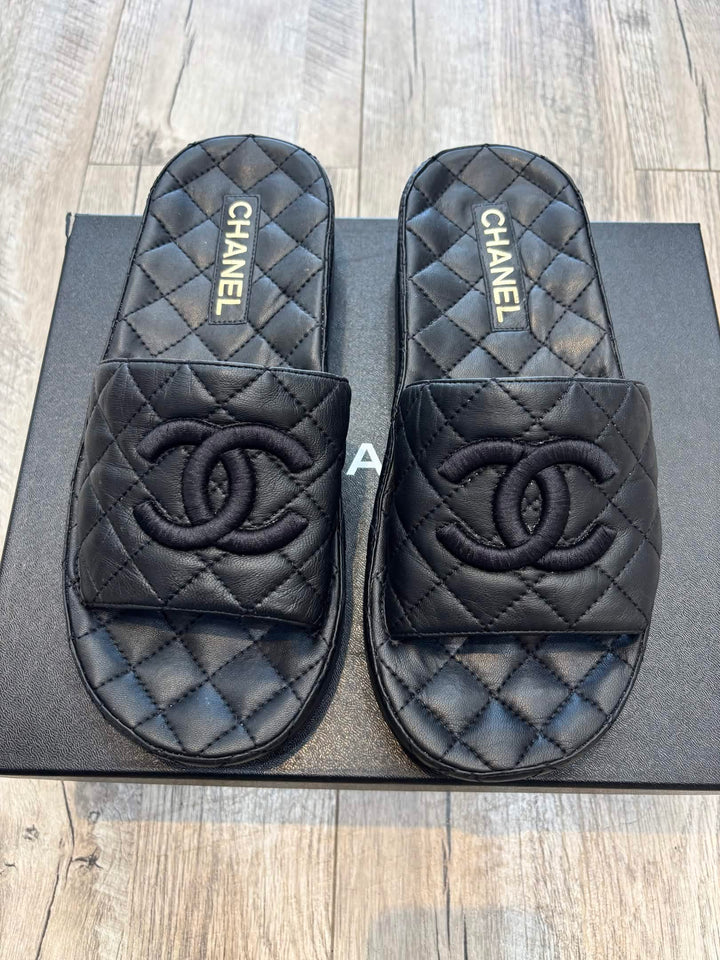 CHANEL QUILTED LAMBSKIN LEATHER CC LOGO MULES