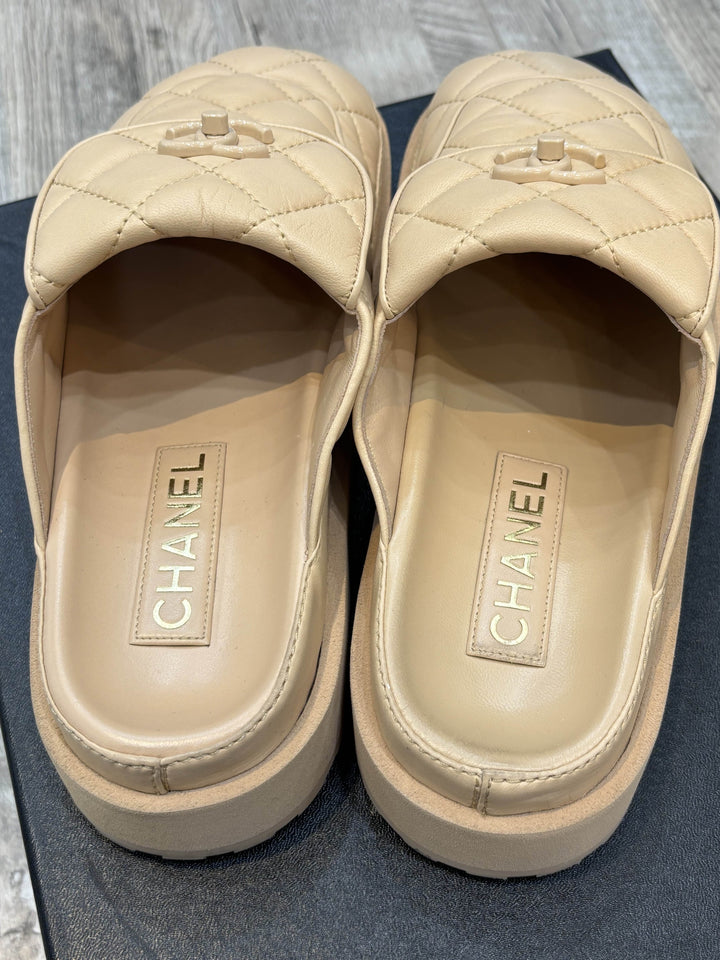 CHANEL TURNLOCK QUILTED MULES