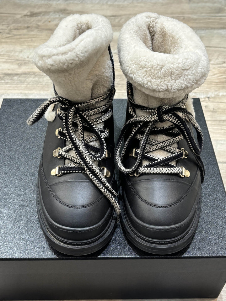 CHANEL CC CALFSKIN LEATHER SHEARLING LACE-UP BOOTS
