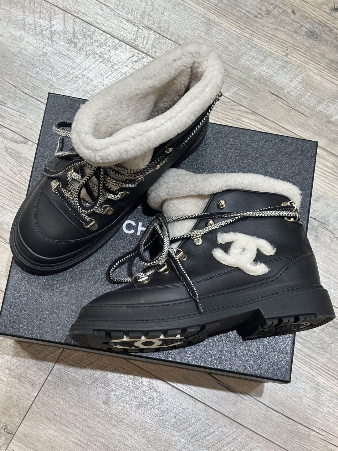 CHANEL CC CALFSKIN LEATHER SHEARLING LACE-UP BOOTS
