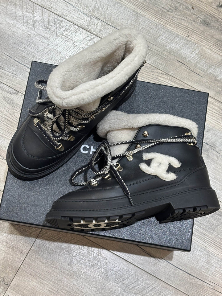 CHANEL CC CALFSKIN LEATHER SHEARLING LACE-UP BOOTS