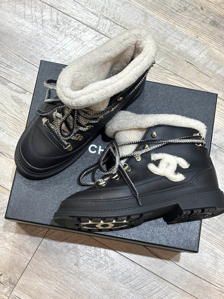 CHANEL CC CALFSKIN LEATHER SHEARLING LACE-UP BOOTS