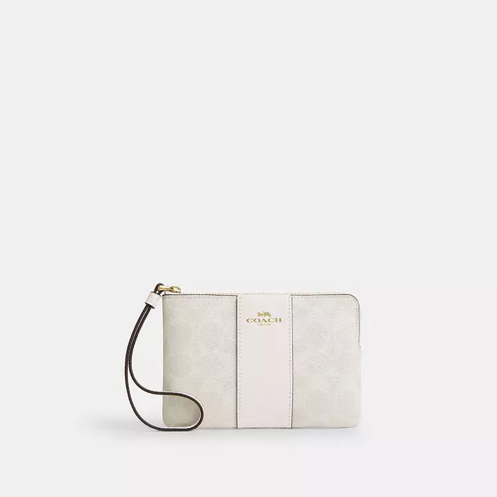 COACH SIGNATURE CANVAS ZIP WRISTLET