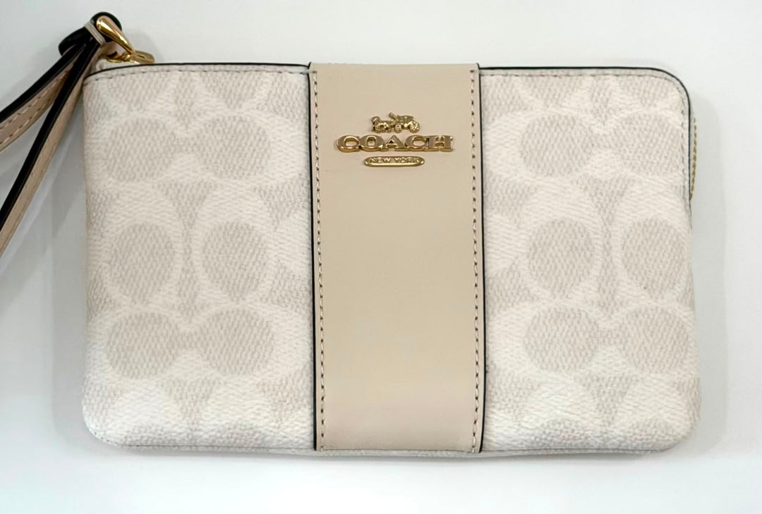 COACH SIGNATURE CANVAS ZIP WRISTLET