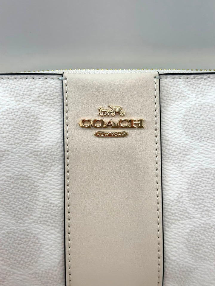 COACH SIGNATURE CANVAS ZIP WRISTLET