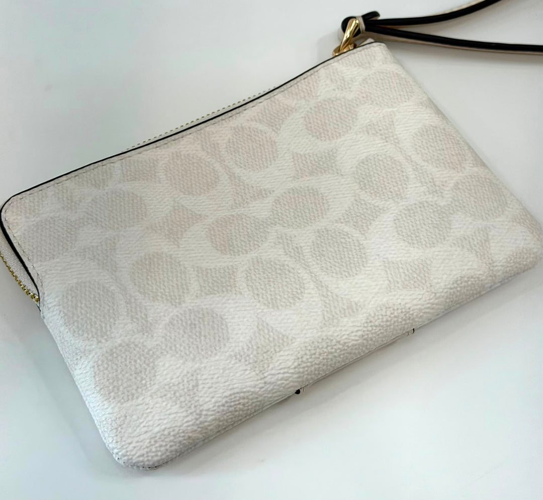 COACH SIGNATURE CANVAS ZIP WRISTLET