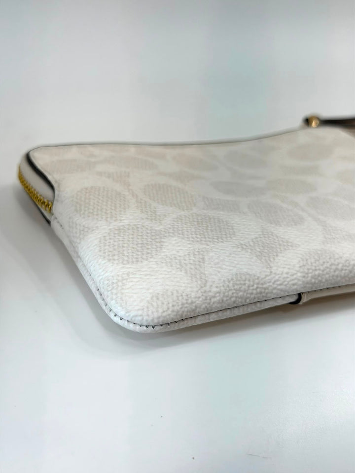 COACH SIGNATURE CANVAS ZIP WRISTLET