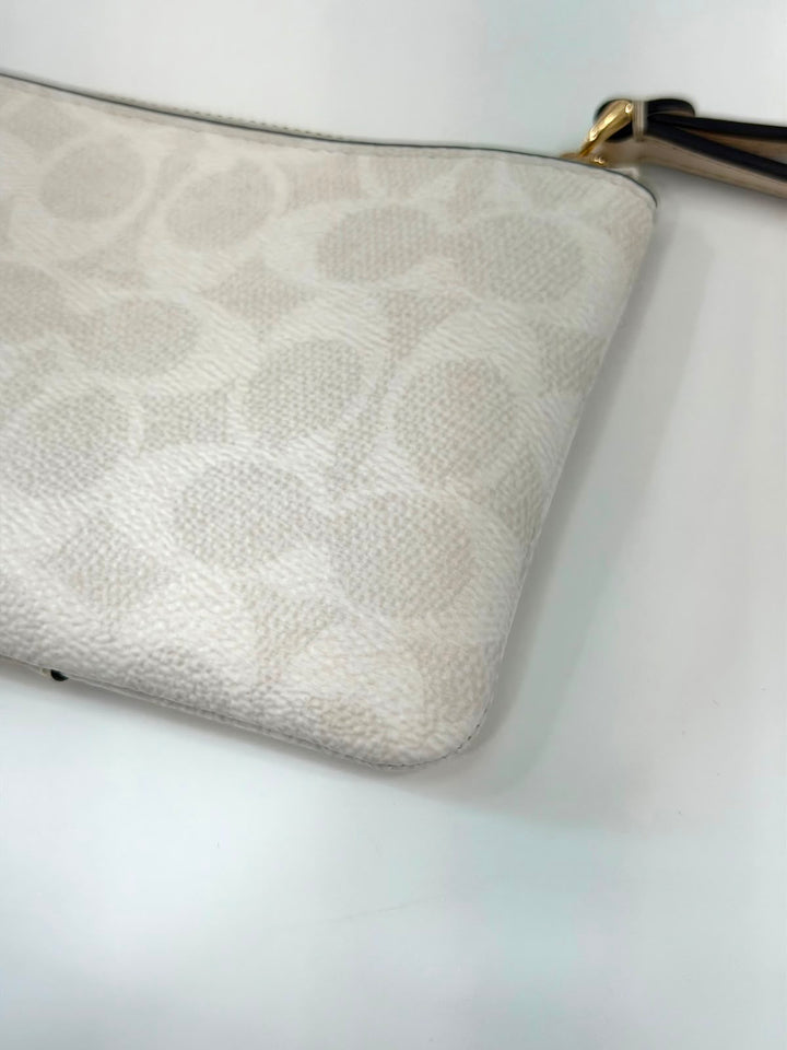 COACH SIGNATURE CANVAS ZIP WRISTLET