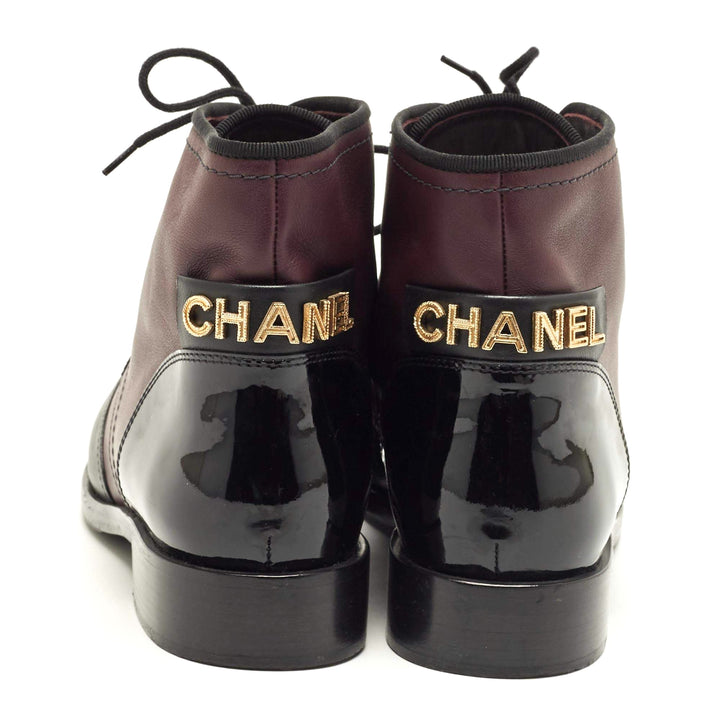 CHANEL CC LOGO CAP TOE CALFSKIN &amp; PATENT LEATHER LACE-UP ANKLE BOOTS
