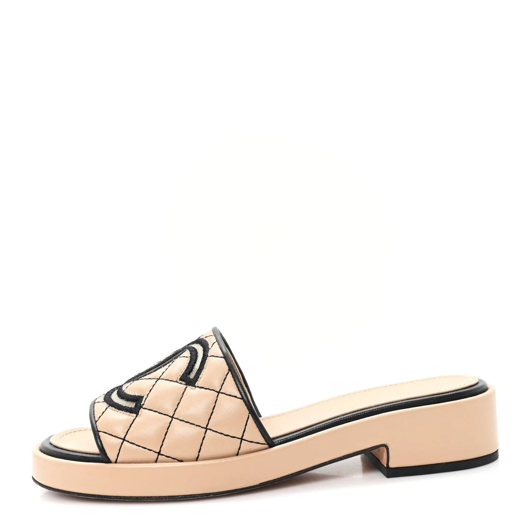 CHANEL CC QUILTED LAMBSKIN LEATHER MULES