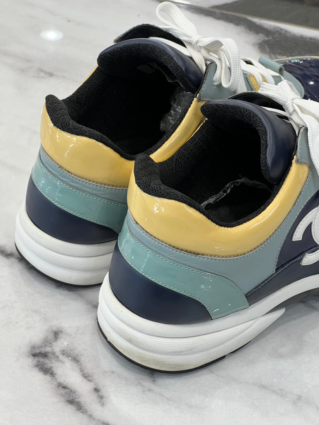 CHANEL CC LOW-TOP TRAINER SNEAKERS