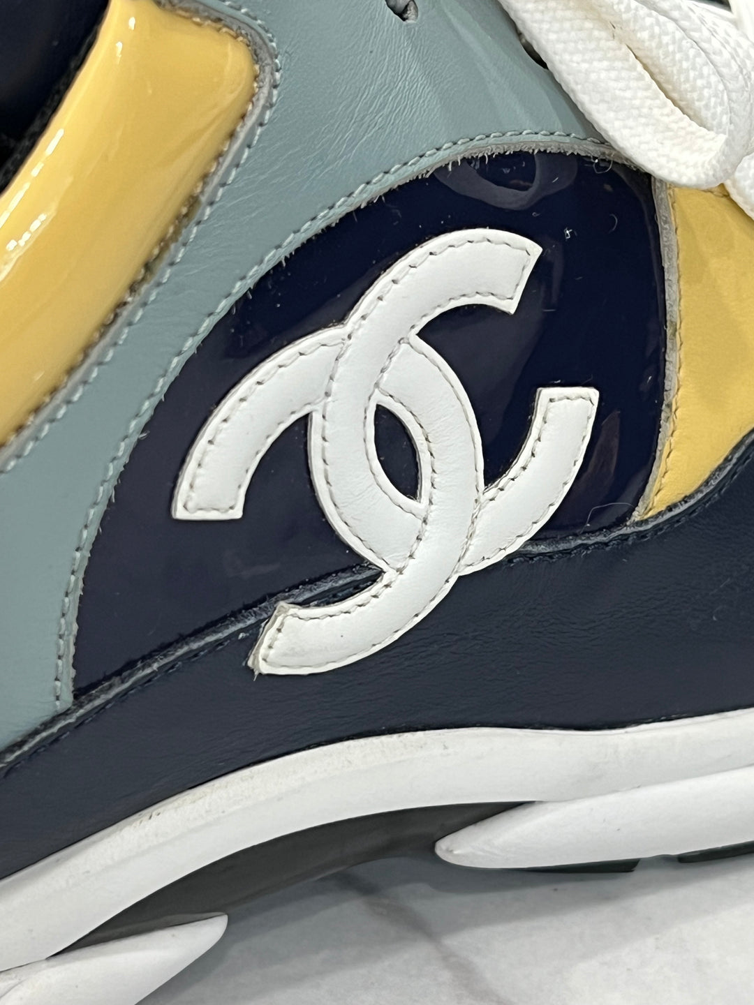 CHANEL CC LOW-TOP TRAINER SNEAKERS