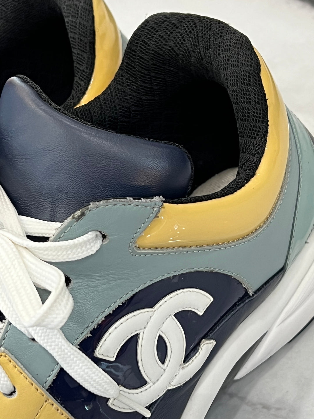 CHANEL CC LOW-TOP TRAINER SNEAKERS
